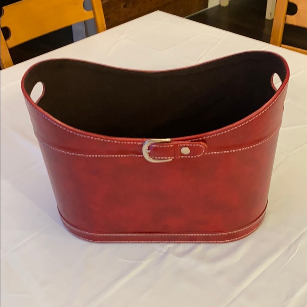 Red leather-like magazine holder.